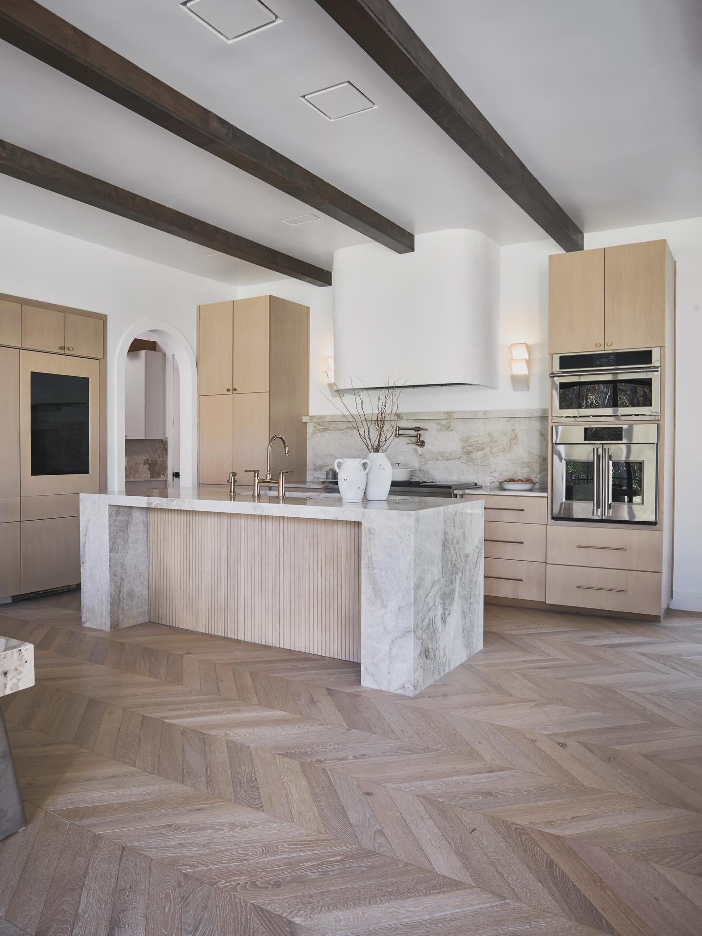 How to Stop Your High-Ceiling Kitchen From Feeling Cold and Empty
